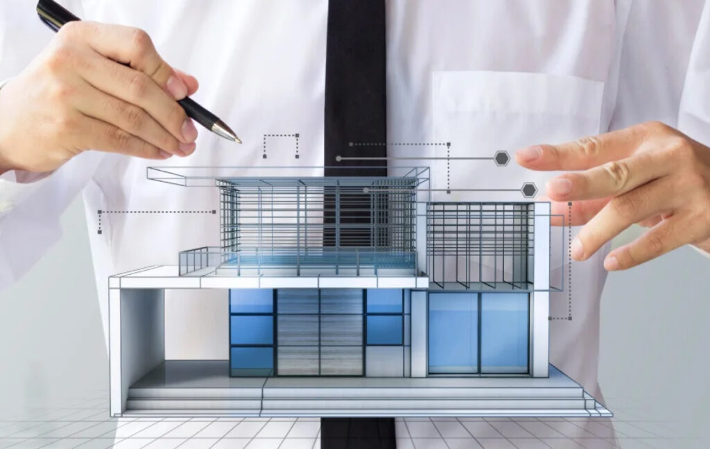 Person in business attire working on a digital 3D architectural model of a modern building